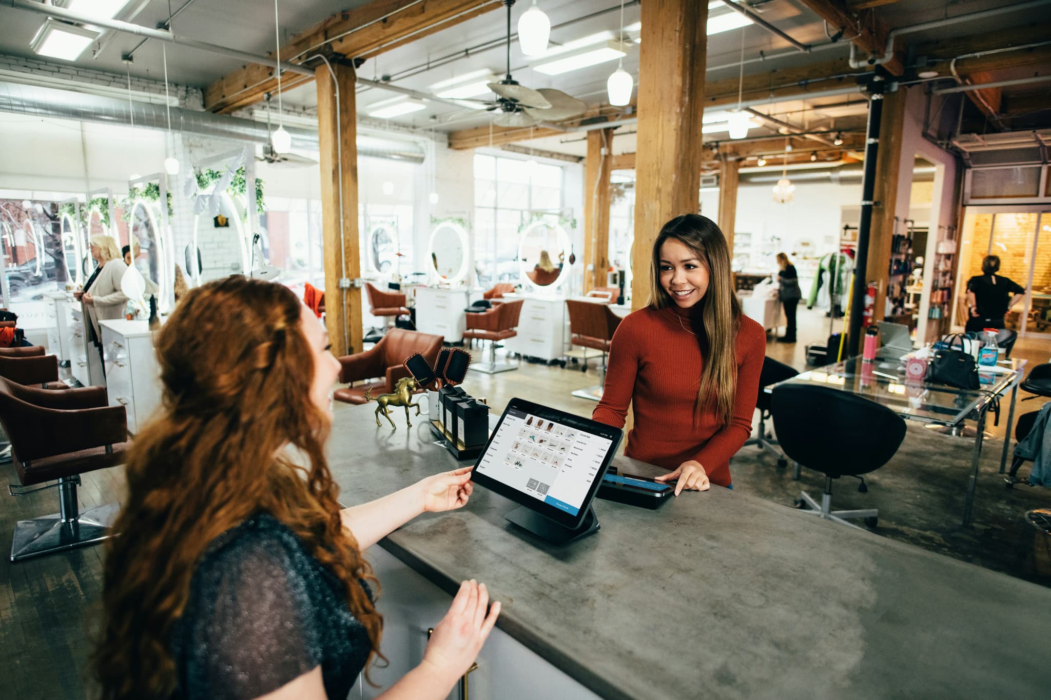 operations front desk check in with tablet
