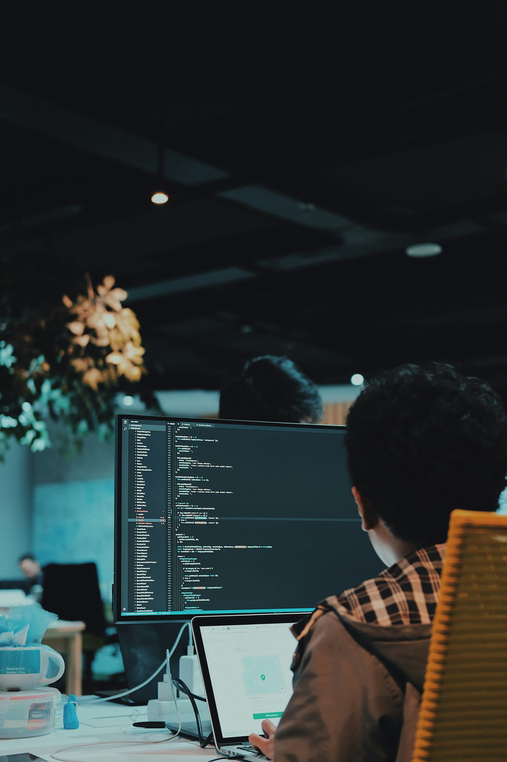 software development developer workstation with dual monitors