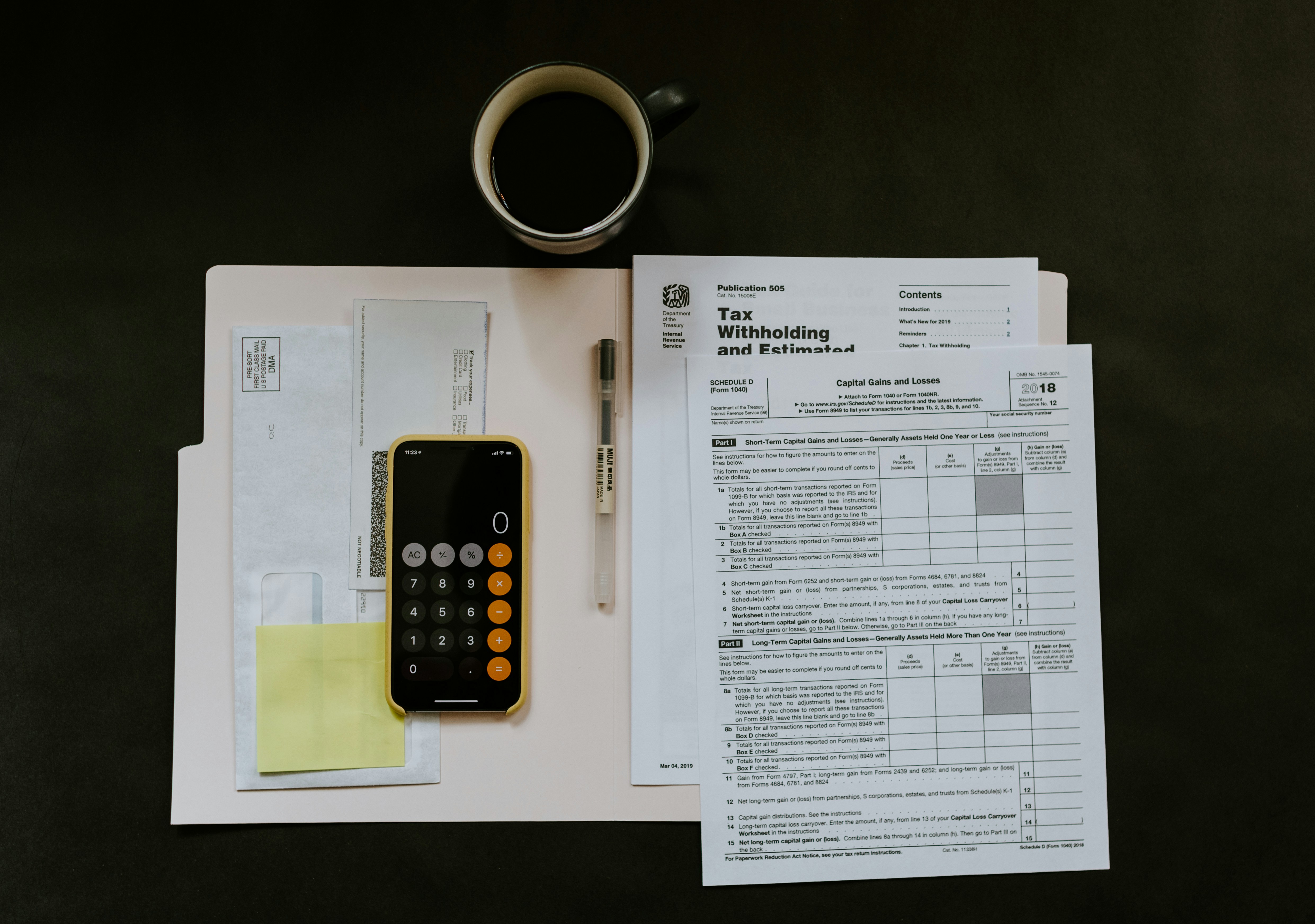 finance accounting tax forms and calculator workspace